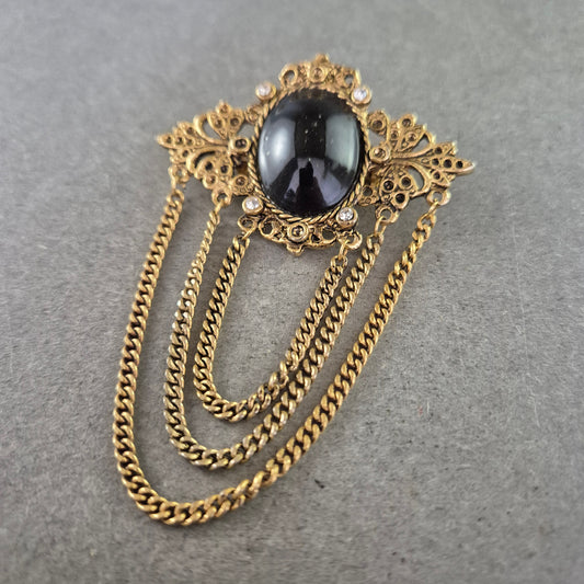 Antike Brosche im Barockstil – Schwarzer Cabochon & Kettendekor