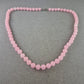 Zarte Halskette mit rosa Perlen – Femininer Look in Pastell