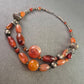 Ethno Halskette mit Karneol und Metallperlen – Ausdrucksstarke Farbtöne