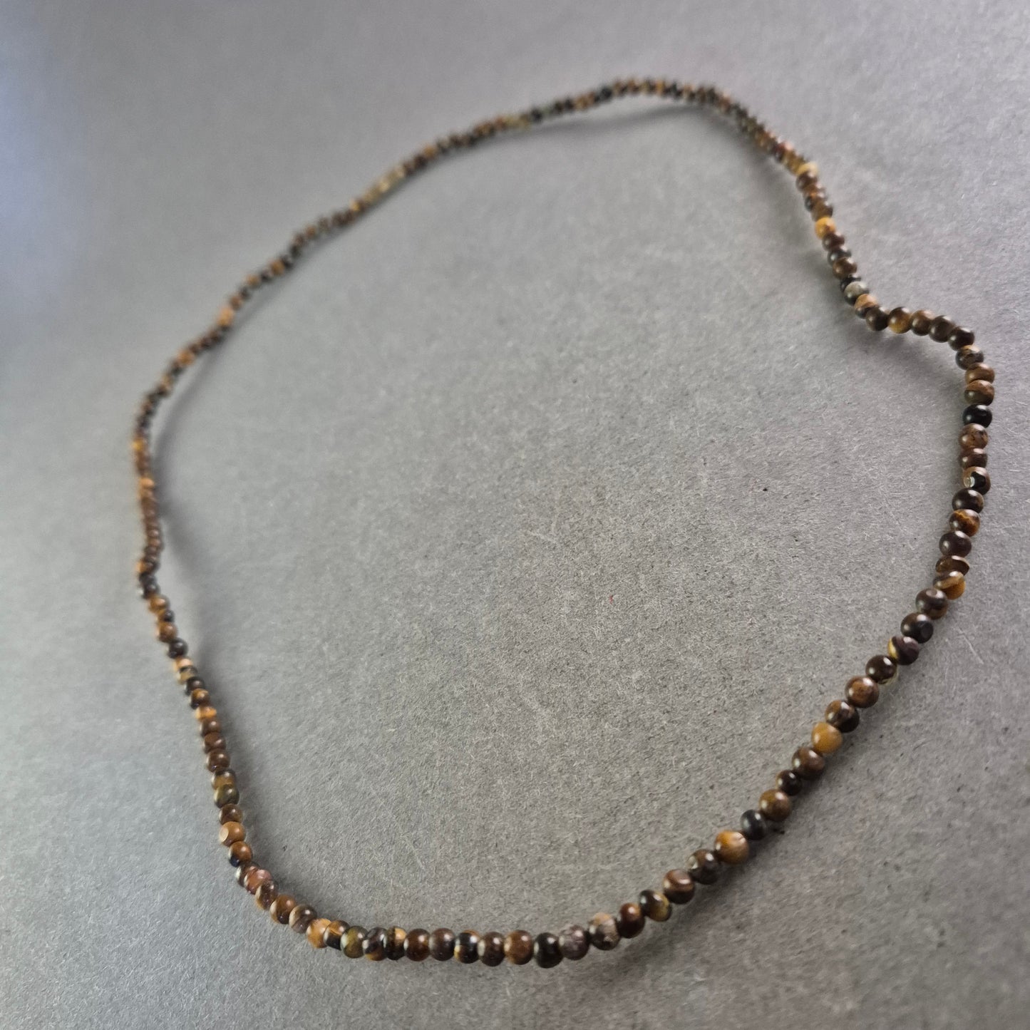 Tigerauge Halskette – Naturstein-Charme mit warmem Glanz