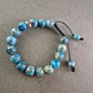 Verstellbares Stein Armband – Blaue Jaspis-Optik mit "CHARISMA"-Bead