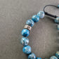 Verstellbares Stein Armband – Blaue Jaspis-Optik mit "CHARISMA"-Bead