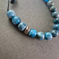 Verstellbares Stein Armband – Blaue Jaspis-Optik mit "CHARISMA"-Bead
