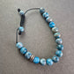 Verstellbares Stein Armband – Blaue Jaspis-Optik mit "CHARISMA"-Bead