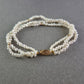 Elegantes Perlen Armband – Dreireihig mit goldfarbenem Verschluss