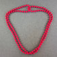 Doppelte Halskette mit roten Kunststoffperlen – Retro-Chic in Knallrot