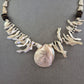 Naturschmuck Halskette mit Muschelanhänger – Maritimer Boho-Stil