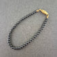 Elegantes Hämatit Armband – Zeitloser Glanz mit Goldverschluss