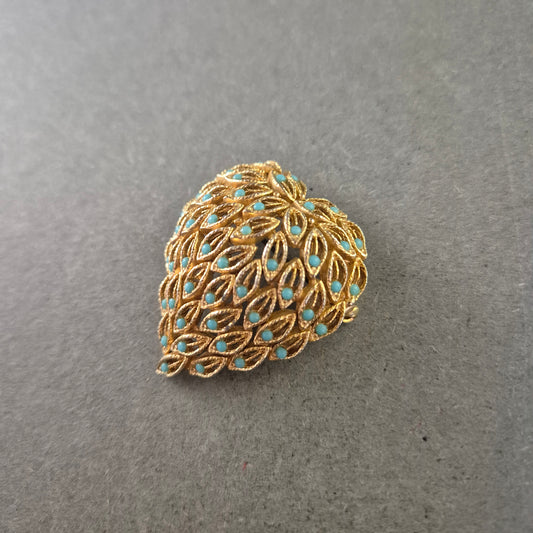 Elegante goldene Brosche mit türkisfarbenen Akzenten – Blattdesign