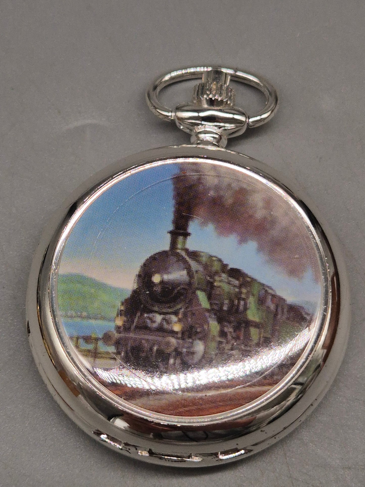 Silberne Skelett Taschenuhr – Offenes Werk & Dampflok-Motiv