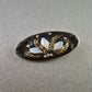 Elegante Vintage Brosche mit opalartigen Steinen und Blättermotiv