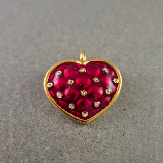 Herzförmige Brosche in Rot mit Strass und Goldfassung