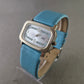 MC Damen Uhr – Rechteckiges Design mit blauem Lederarmband