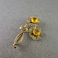 Vintage Blumen Brosche – Goldfarben mit gelben Schmucksteinen