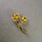 Vintage Blumen Brosche – Goldfarben mit gelben Schmucksteinen