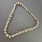 Elegante Perlen Kette mit goldfarbenen Zwischenelementen – Klassisches Design