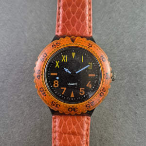 Ausgefallene Herren Uhr – Quarzwerk mit orangefarbenem Design