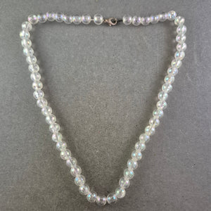Elegante Perlenkette – Schimmerndes Design mit Irisierendem Glanz