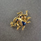 Goldfarbene Kraken Brosche mit blauen Steinen – Maritimer Eyecatcher