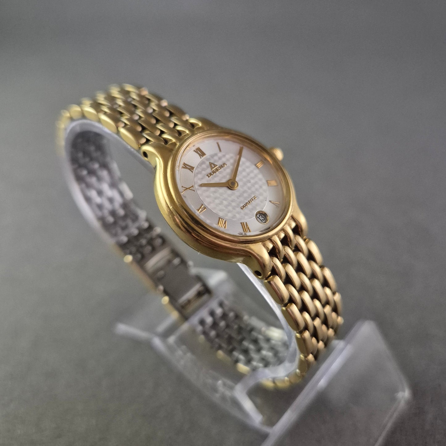 Damen Uhr Dugena Quartz Gold mit römischen Ziffern und Datumsanzeige