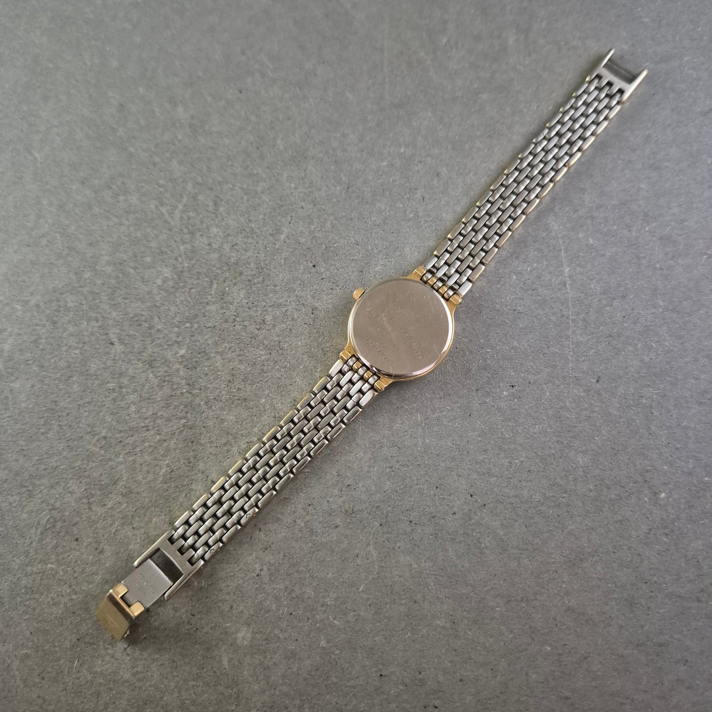 Damen Uhr Dugena Quartz Gold mit römischen Ziffern und Datumsanzeige