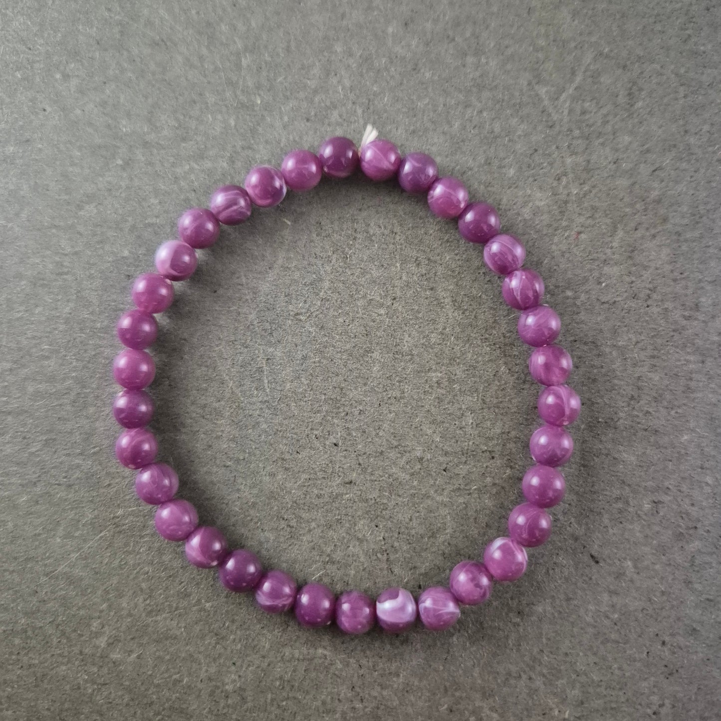 Damen Armband Lila/Magenta Perlen auf Stretchband