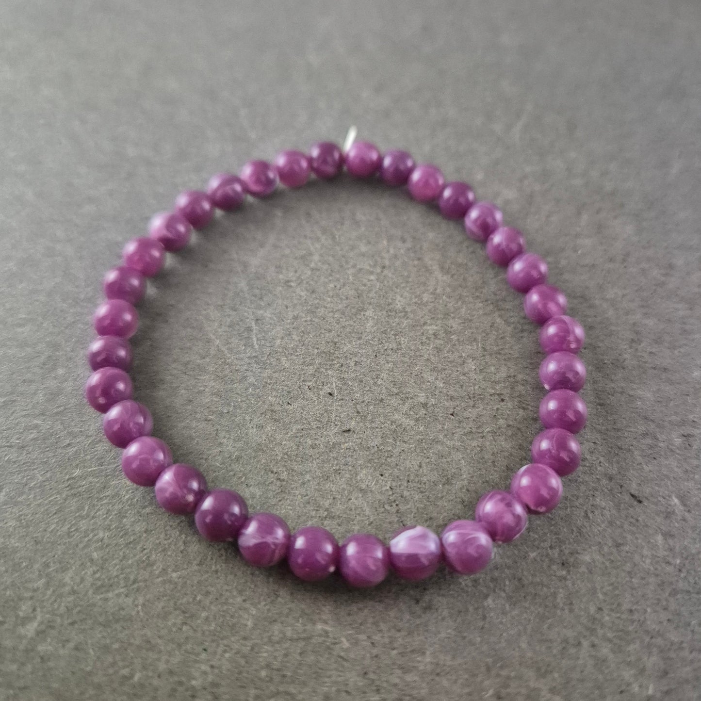 Damen Armband Lila/Magenta Perlen auf Stretchband