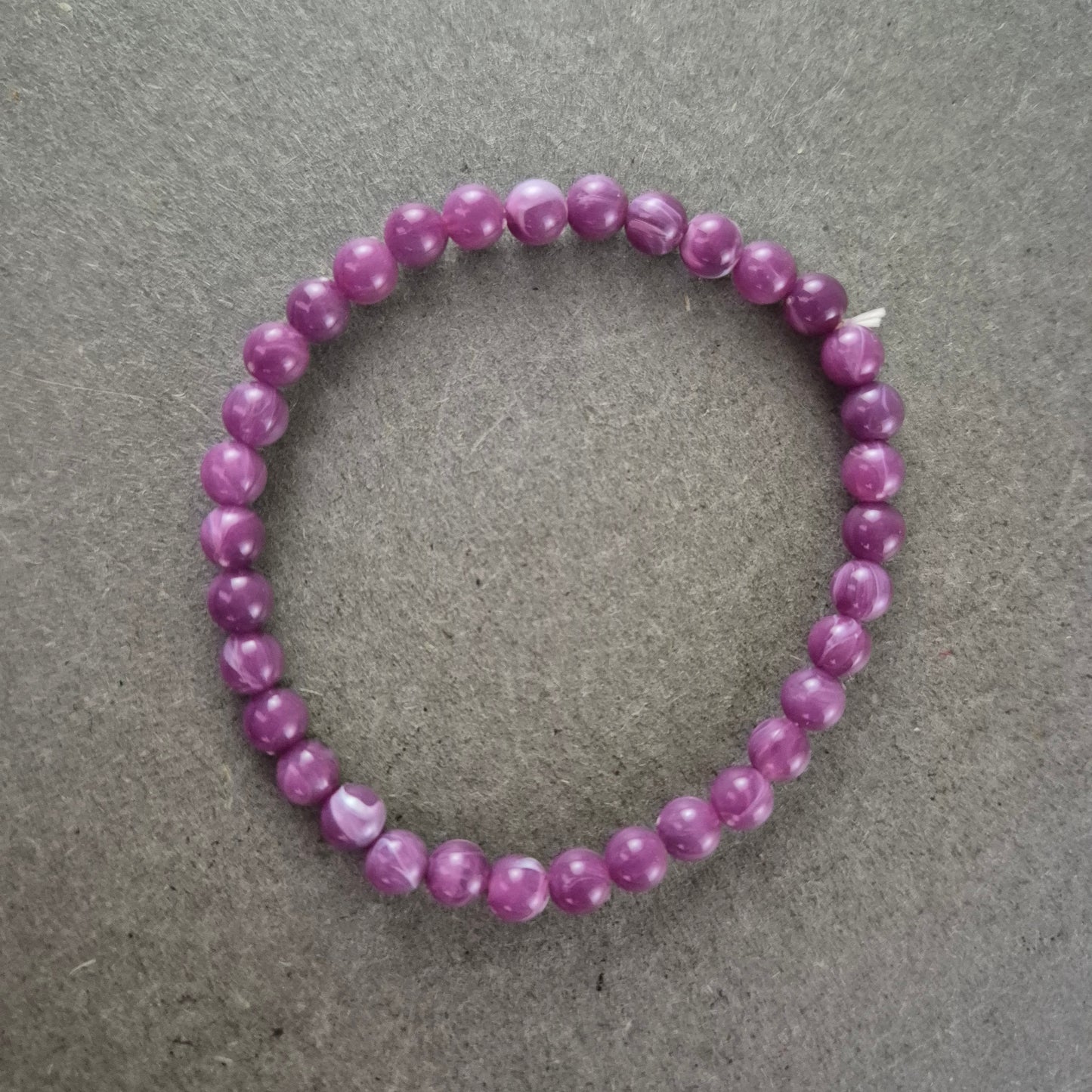 Damen Armband Lila/Magenta Perlen auf Stretchband