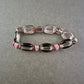 Vintage Armband in Schwarz-Silber mit roten Akzenten – Funkelnd & Elegant