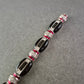 Vintage Armband in Schwarz-Silber mit roten Akzenten – Funkelnd & Elegant