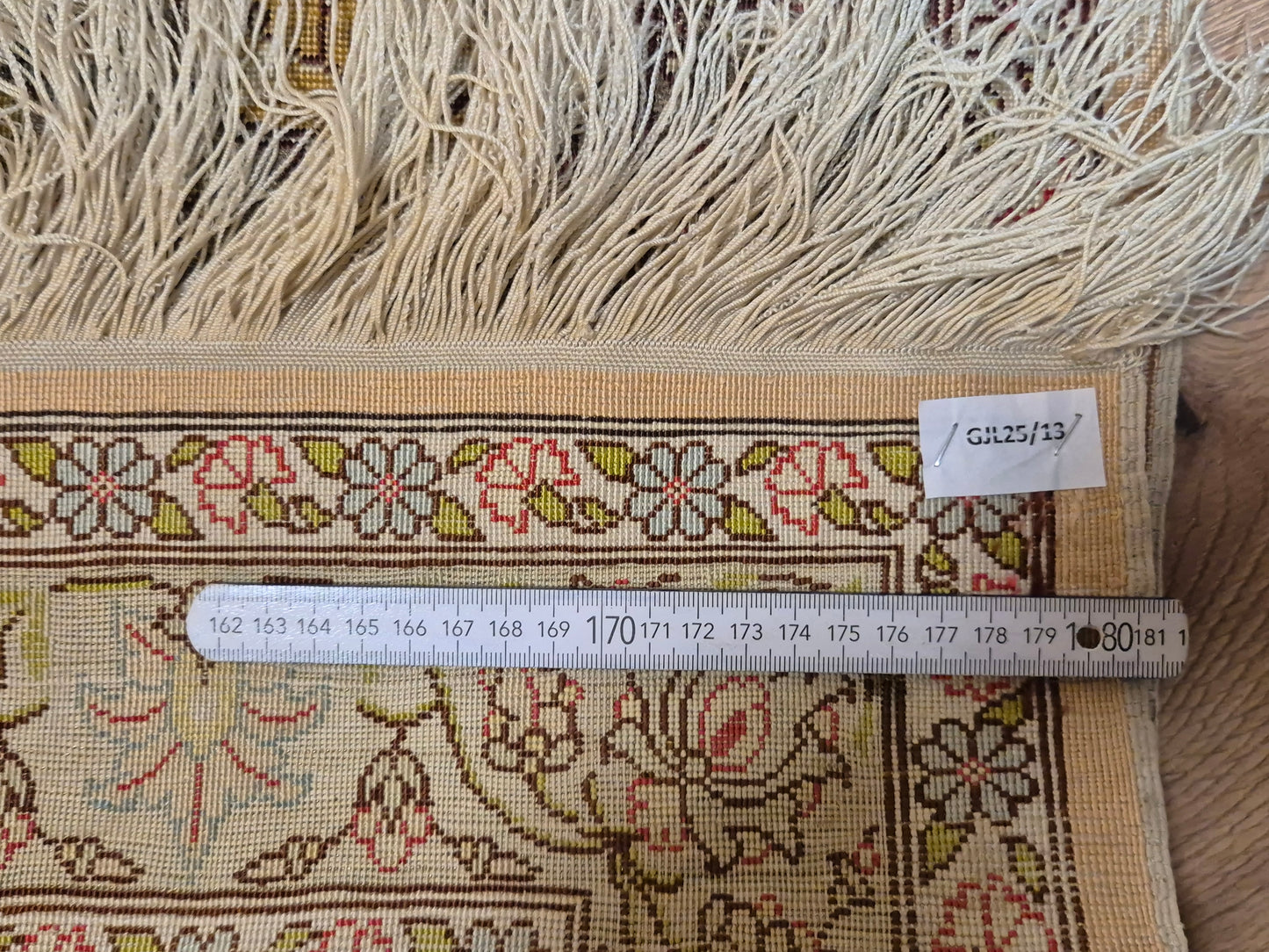 Hereke Teppich – reine Seide, signiert, feine Knüpfung