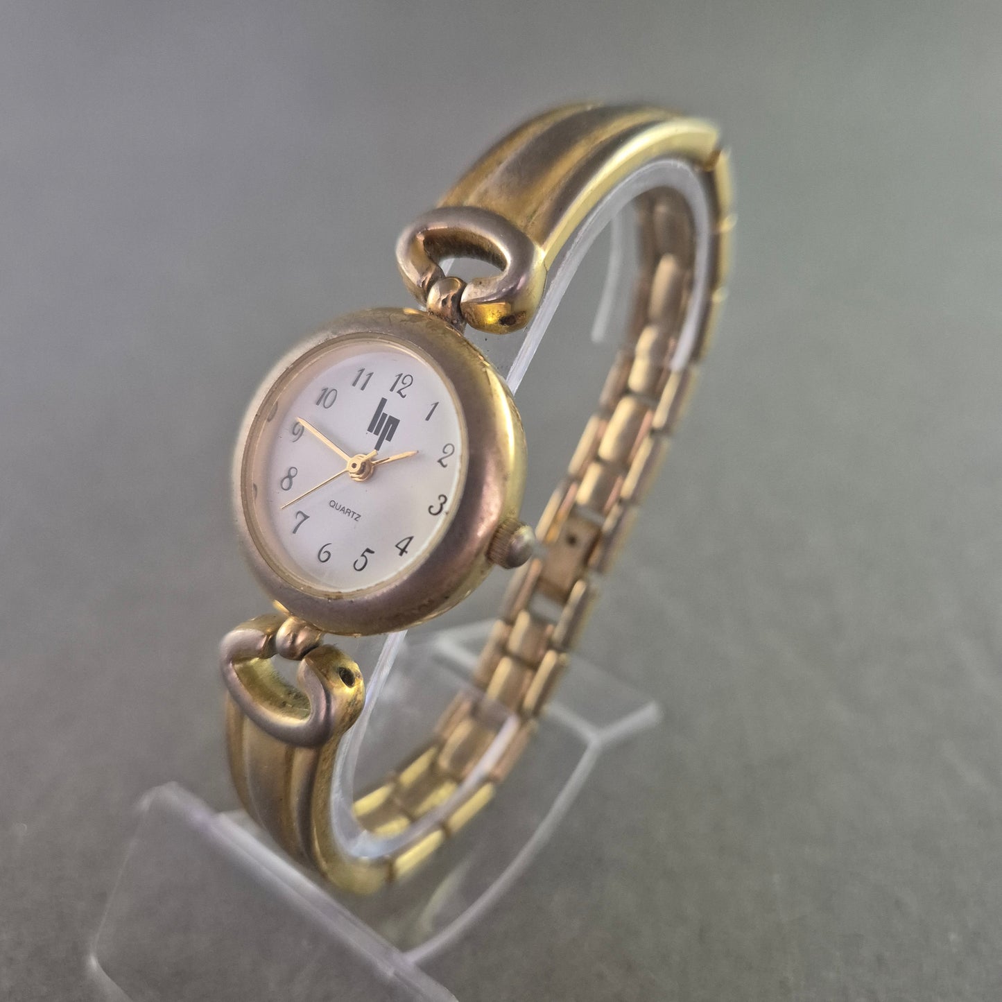 LIP Damen Uhr – Vintage Design mit goldfarbenem Armband