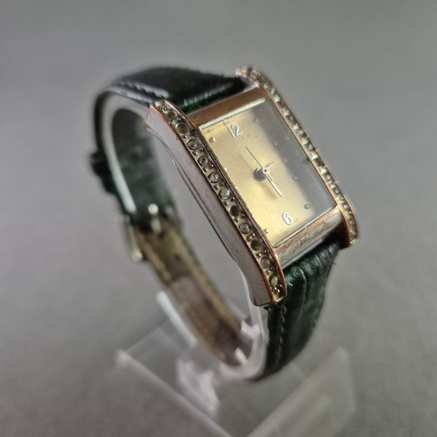 Elegante Damen Uhr mit Strass und dunkelgrünem Lederband