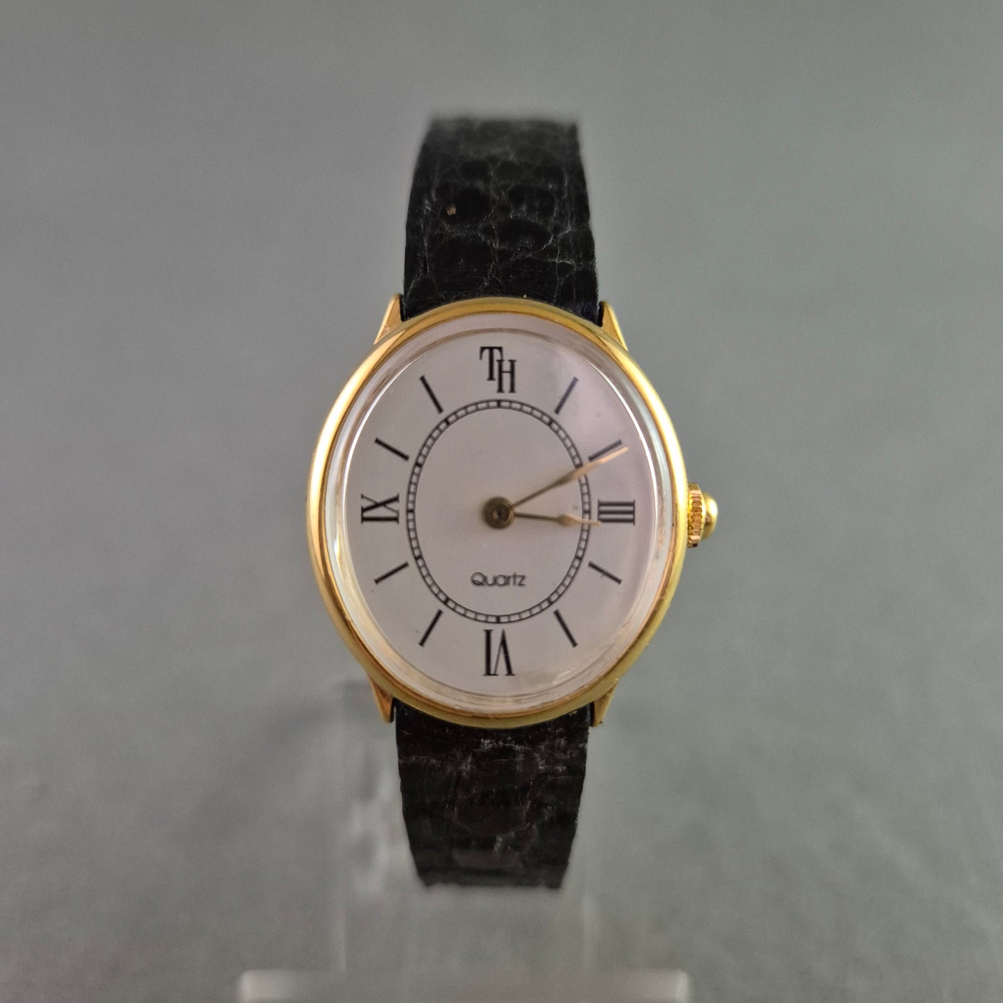 Klassische Damen Uhr TH mit römischen Ziffern und Krokoband