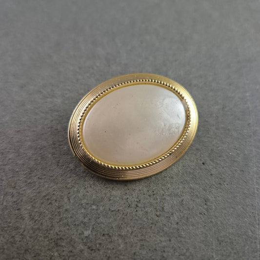 Elegante Vintage Brosche mit Perlmutt-Effekt und Goldrand