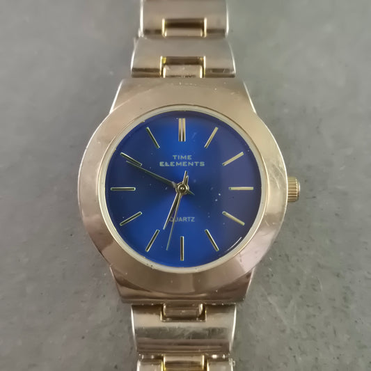 Time Elements Damen Uhr mit Blauem Zifferblatt und Goldarmband