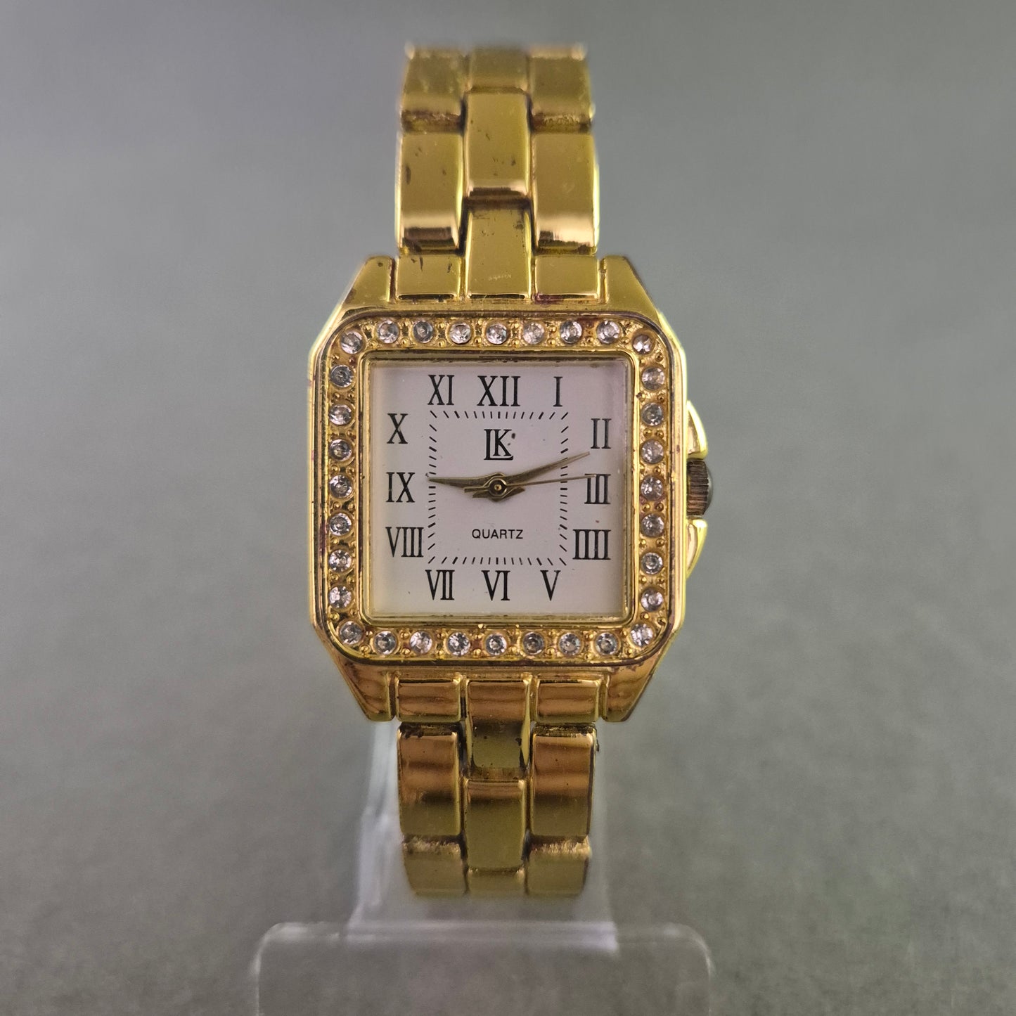 Elegante Damen Uhr in Goldoptik mit Strassbesatz