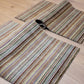 Handgeknüpfter Wollteppich mit traditionellem Streifenmuster