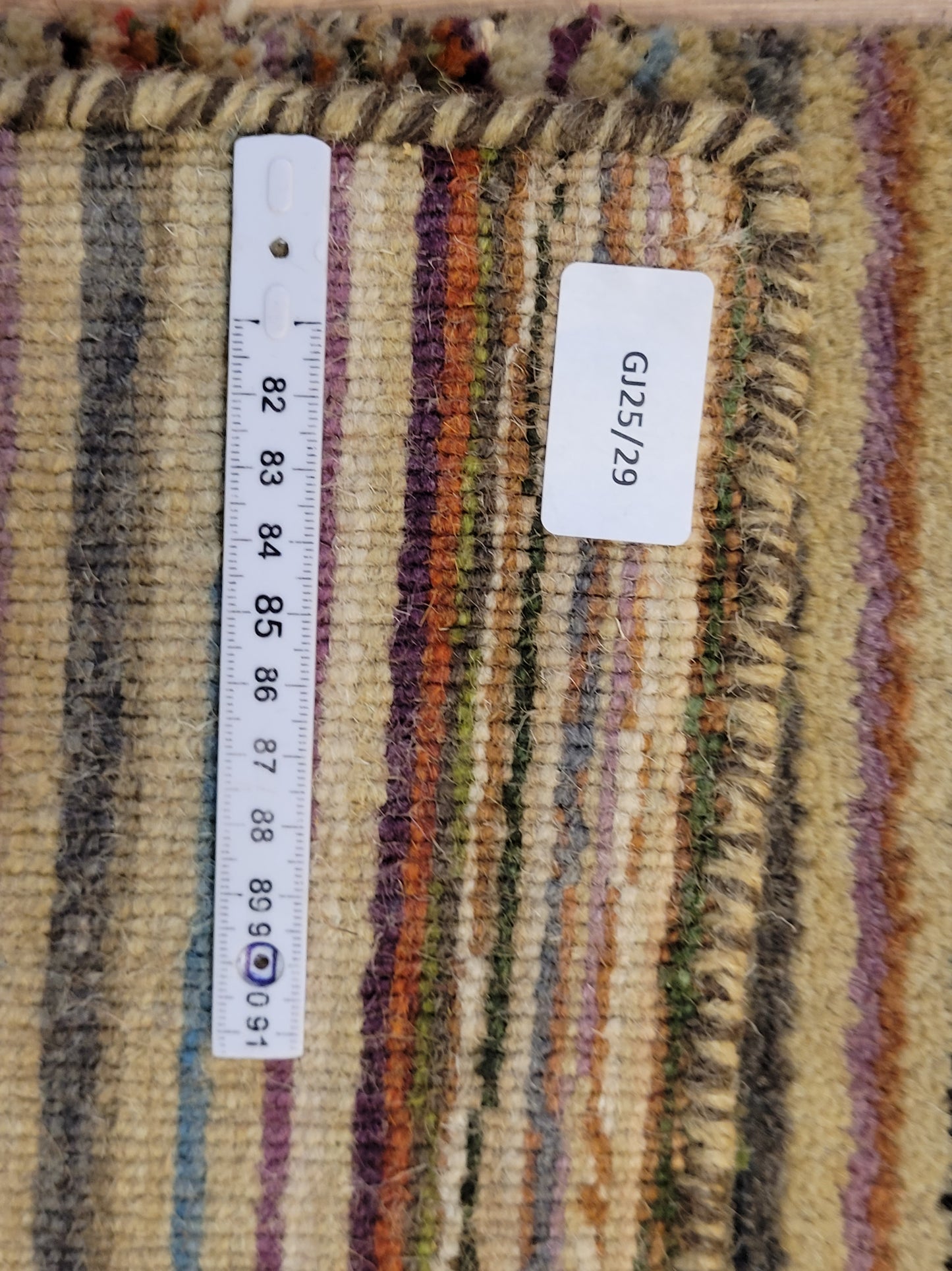 Handgeknüpfter Wollteppich mit traditionellem Streifenmuster