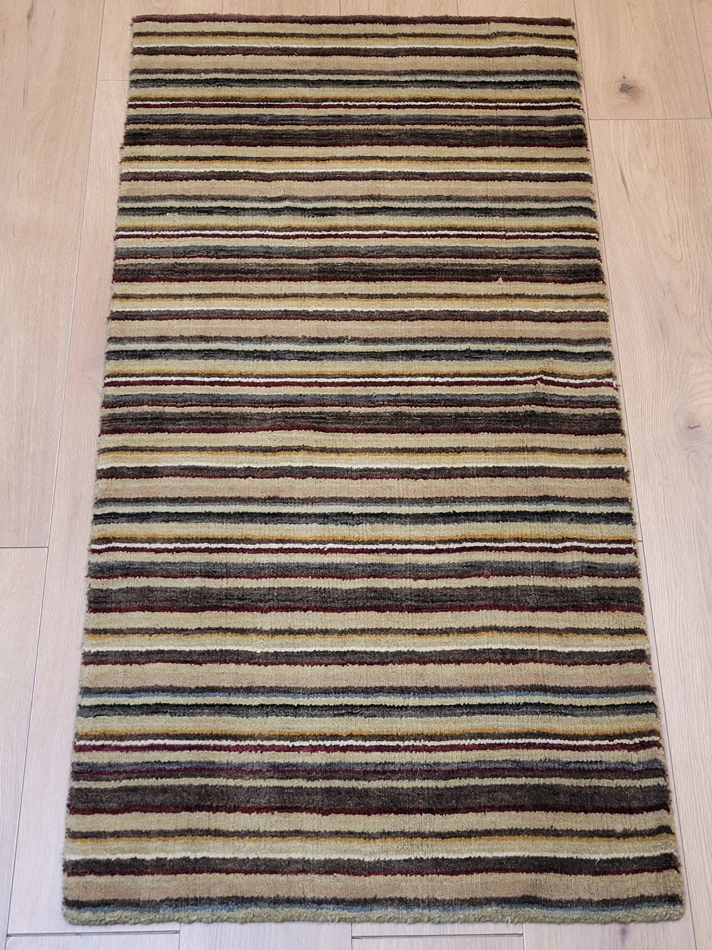 Streifenteppich Korkwolle, modernes Muster