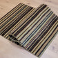 Streifenteppich Korkwolle, modernes Muster
