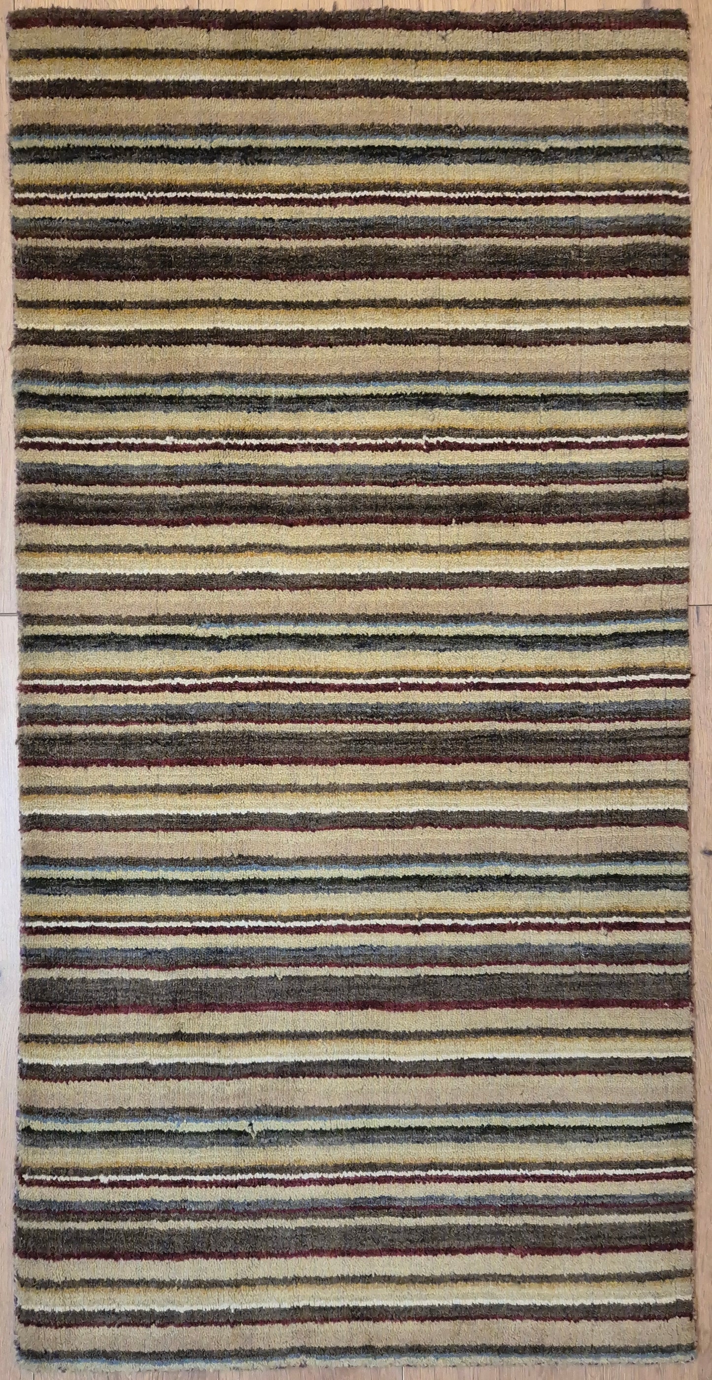 Perser Gabbeh Teppich Schurwolle Streifenmuster erdige Farbpalette