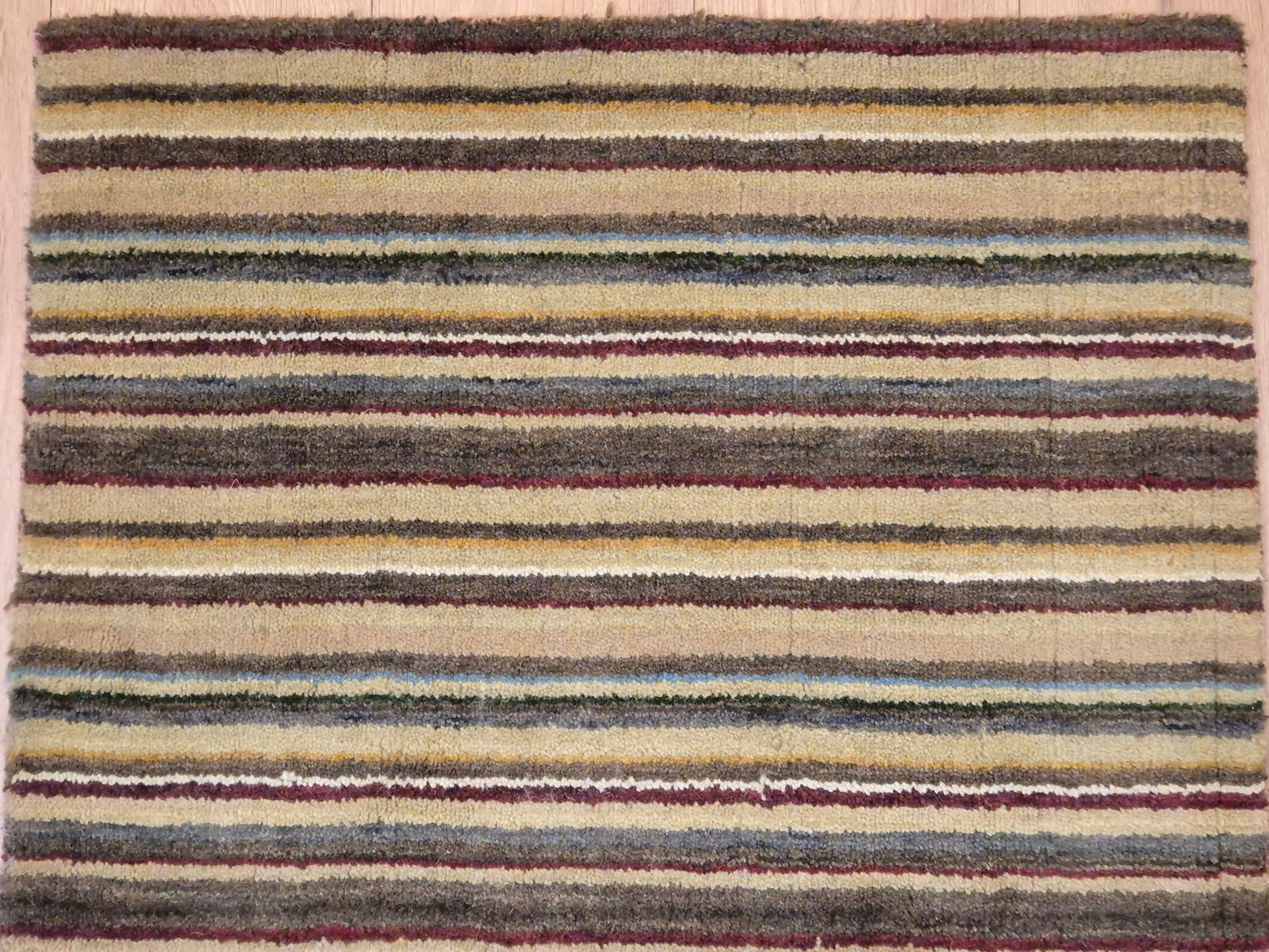 Perser Gabbeh Teppich Schurwolle Streifenmuster erdige Farbpalette