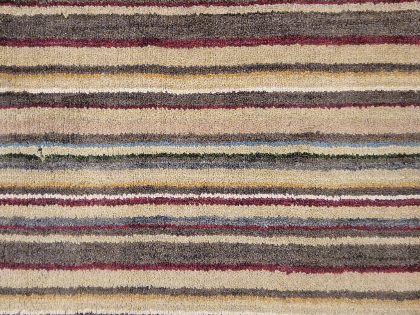 Perser Gabbeh Teppich Schurwolle Streifenmuster erdige Farbpalette