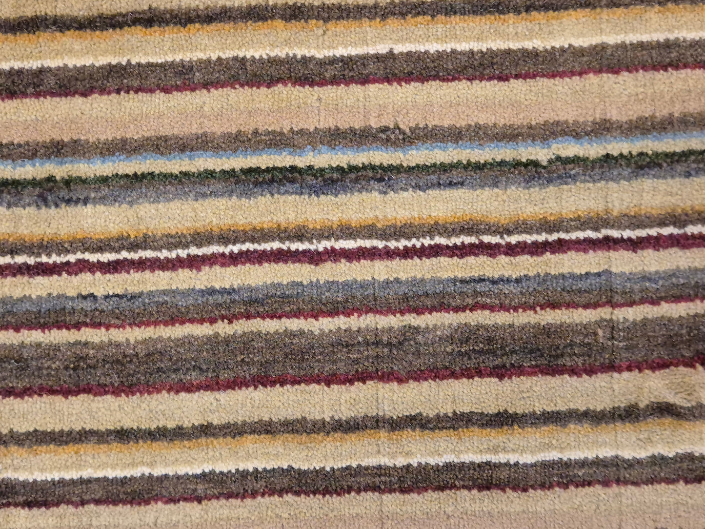 Perser Gabbeh Teppich Schurwolle Streifenmuster erdige Farbpalette