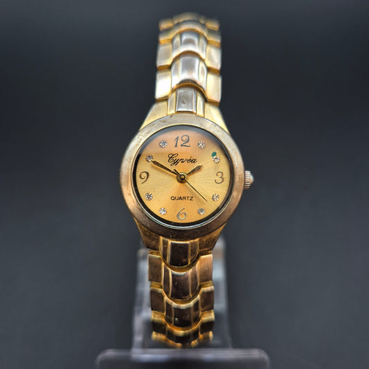 Cyprea Damen Uhr – Quarz, Goldfarben mit Glitzersteinen