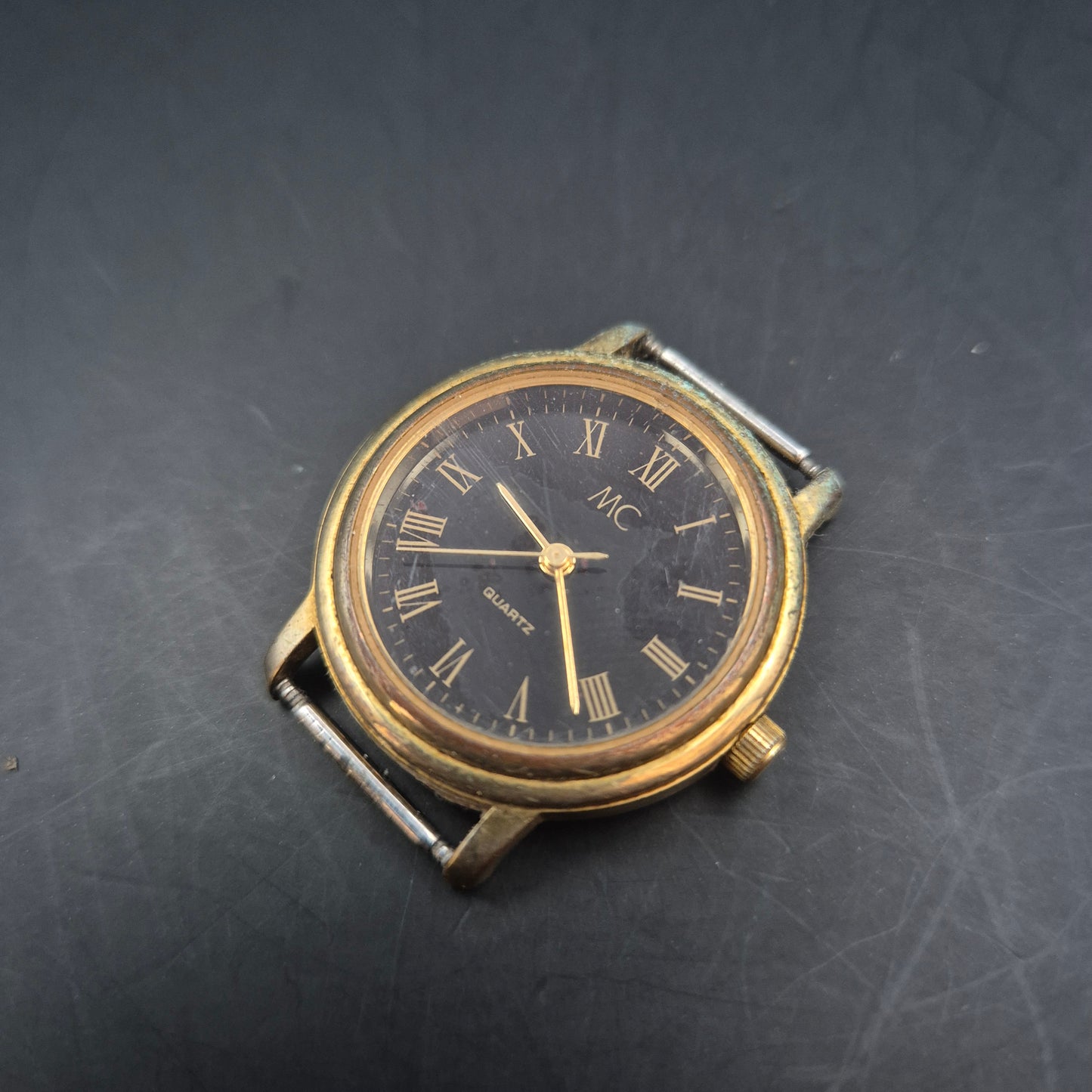 MC Damen Uhr – Quarz, Goldfarben mit schwarzem Zifferblatt (ohne Armband)