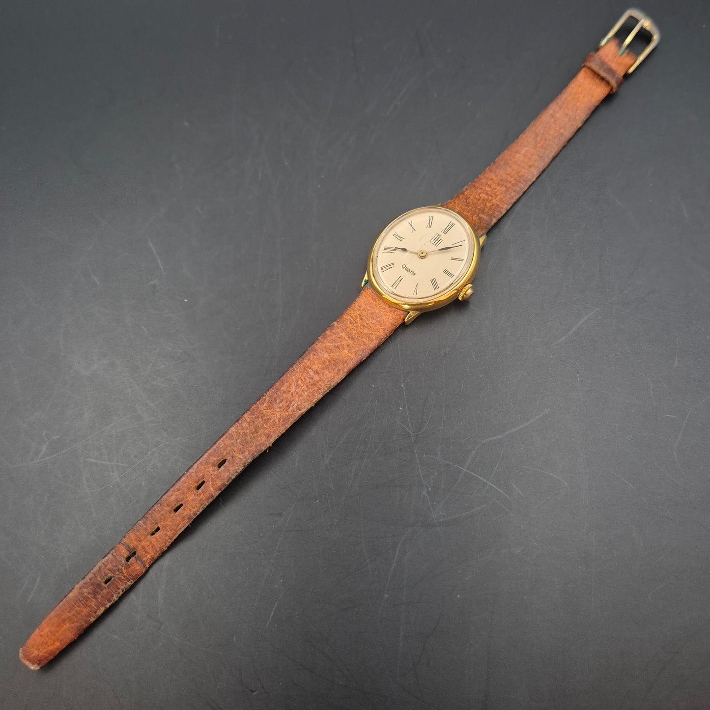 LH Damen Uhr – Quarz, Goldfarben mit römischen Ziffern