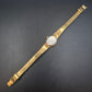Elegante Dugena Damen Uhr – Goldton mit funkelndem Zierkranz