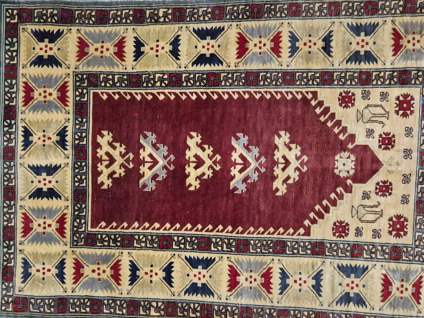 Hereke Seidenteppich Gebetsteppich geometrisches Design fein handgeknüpft